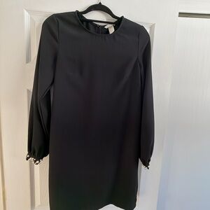 Black dress with pearl sleeves